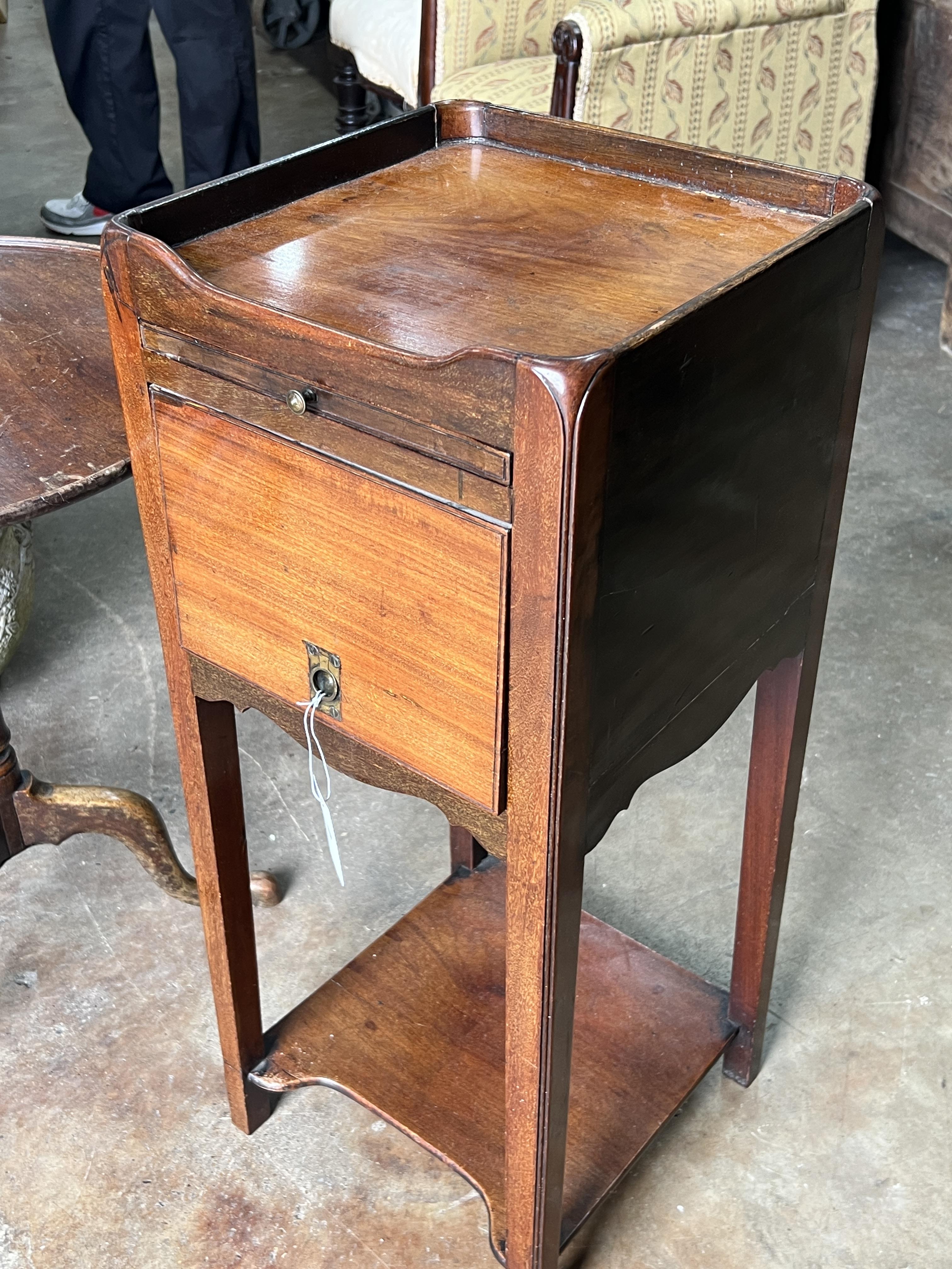 A George III mahogany tray top bedside cupboard, width 33cm, depth 33cm, height 81cm together with a 19th century circular tilt top wine table